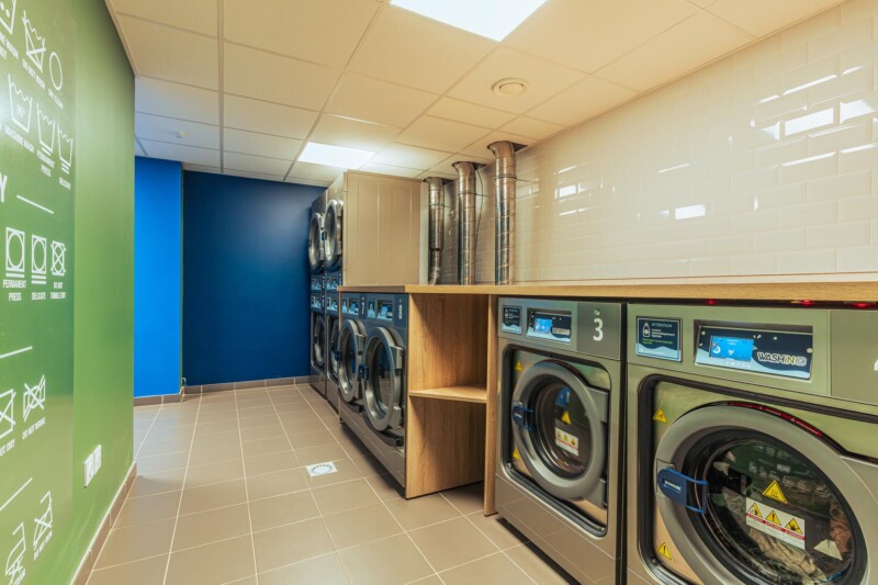 Laverie de la résidence étudiante Babylone à Lille, avec machine à laver