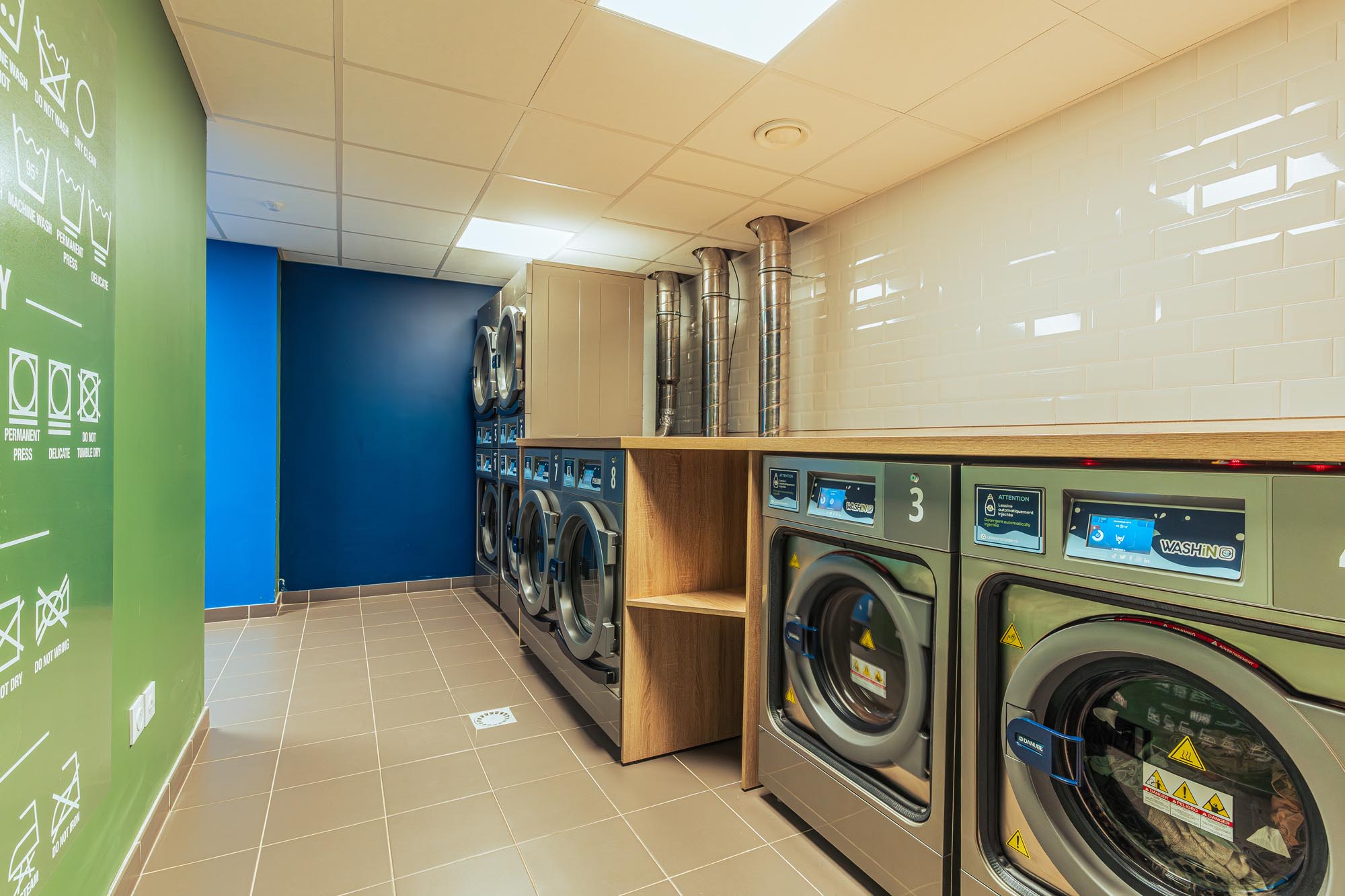 Laverie de la résidence étudiante Babylone à Lille, avec machine à laver