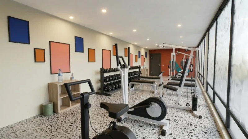 Espace fitness lumineux avec équipements de sport dans une résidence partagée à Bezons, dédié au bien-être des résidents